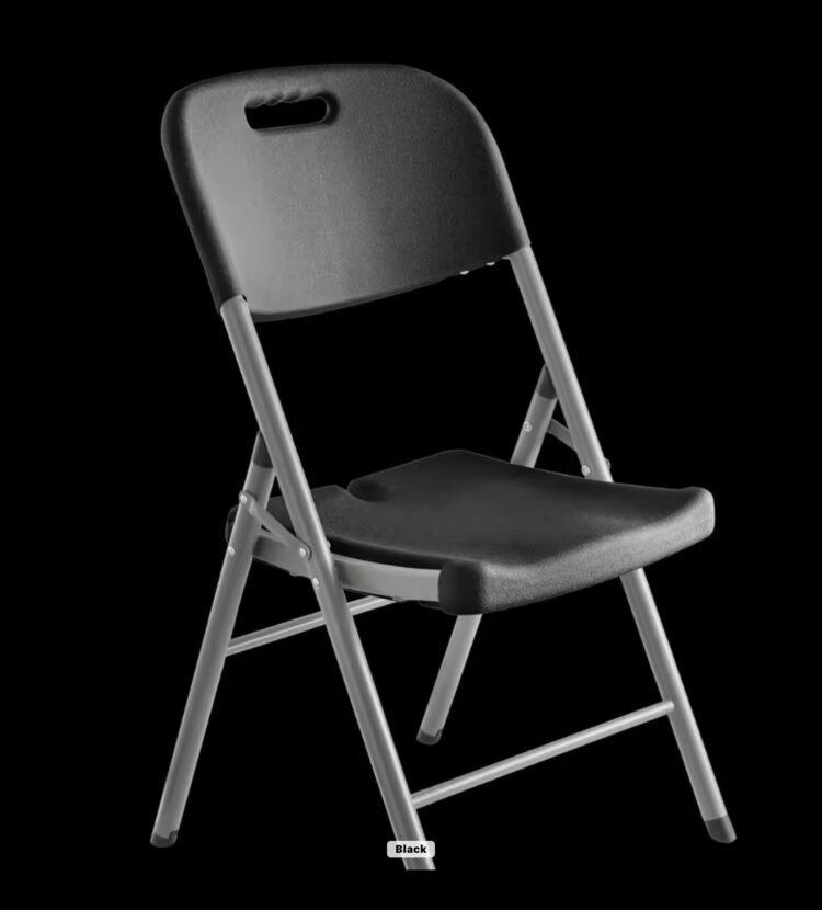 Foldable Mighty National Public Chair in black, designed for conferences, event centers, and indoor venues.
